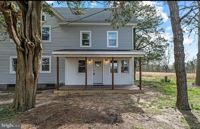 1832 E Buckshutem Rd, Millville, NJ 08332 - view of front facade featuring roof with shingles and a porch