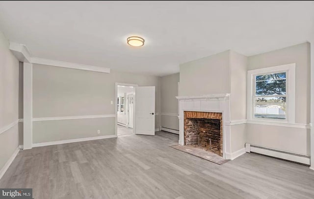1832 E Buckshutem Rd, Millville, NJ 08332 - unfurnished living room featuring a baseboard radiator, wood finished floors, and a fireplace with flush hearth