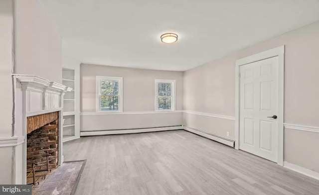 1832 E Buckshutem Rd, Millville, NJ 08332 - unfurnished living room with wood finished floors, baseboard heating, and a brick fireplace