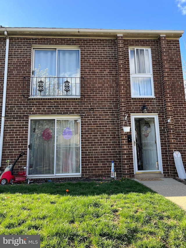 9001 Ridge Ave Unit 31, Philadelphia, PA 19128 - view of front of property with a front yard and brick siding