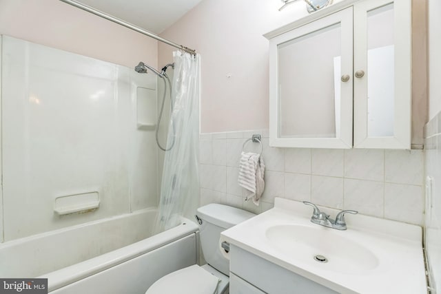 9001 Ridge Ave Unit 31, Philadelphia, PA 19128 - bathroom with vanity, shower / bath combo with shower curtain, and tile walls