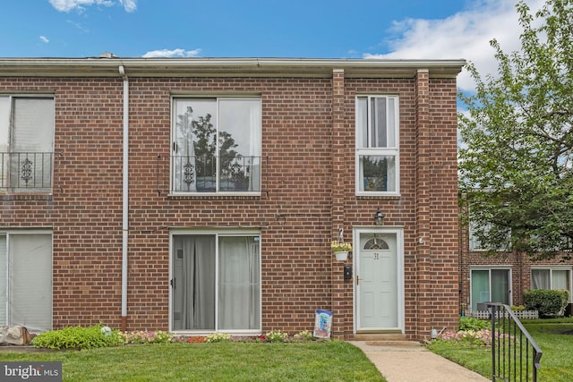 9001 Ridge Ave Unit 31, Philadelphia, PA 19128 - townhome / multi-family property featuring brick siding and a front lawn