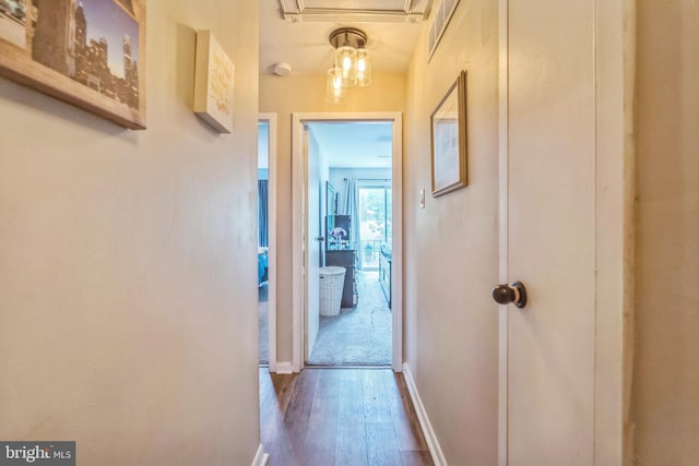 9001 Ridge Ave Unit 31, Philadelphia, PA 19128 - corridor featuring dark wood-style flooring and a wall unit AC