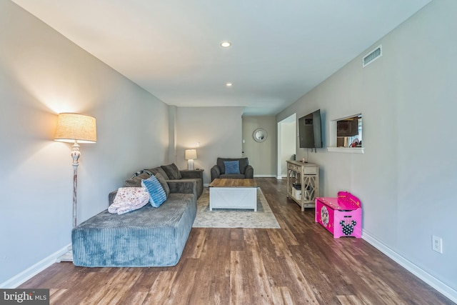 9001 Ridge Ave Unit 31, Philadelphia, PA 19128 - living area with wood finished floors and recessed lighting