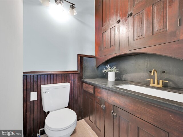 221 Orchard St, Auburn, PA 17922 - half bath featuring a wainscoted wall and vanity