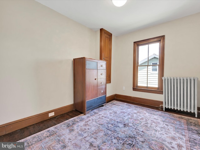 221 Orchard St, Auburn, PA 17922 - unfurnished bedroom with radiator heating unit and wood finished floors