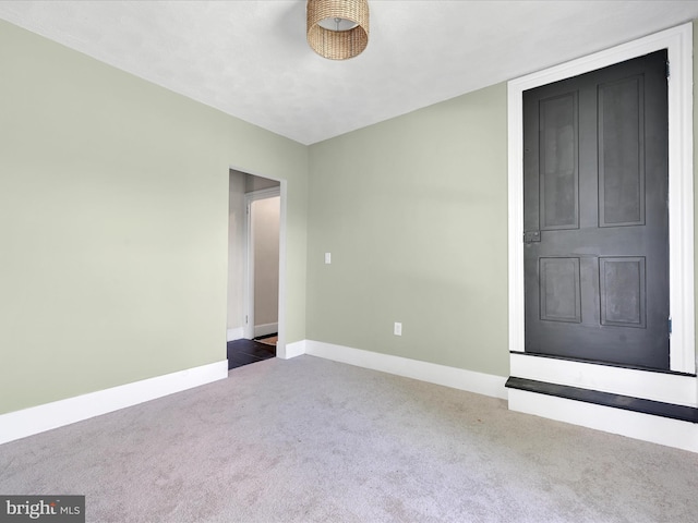 221 Orchard St, Auburn, PA 17922 - carpeted empty room featuring baseboards