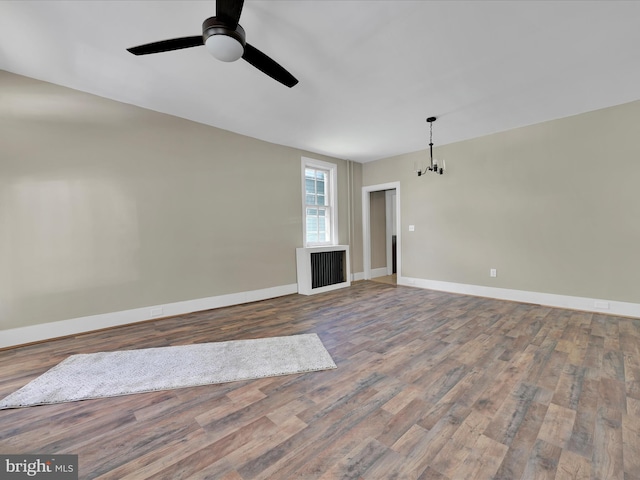 221 Orchard St, Auburn, PA 17922 - unfurnished living room featuring a ceiling fan and wood finished floors