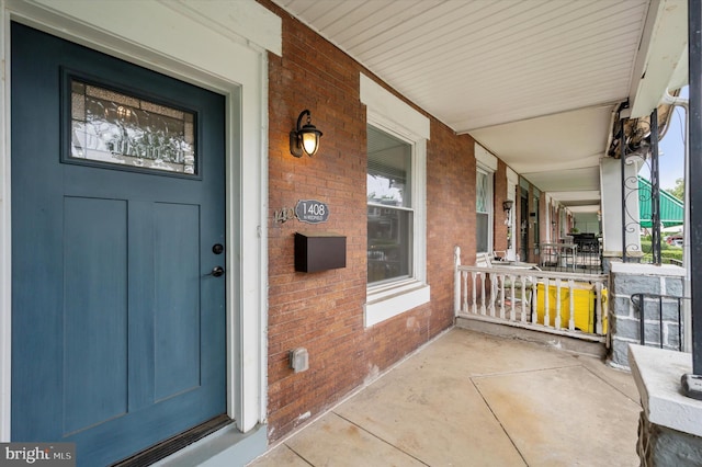 1408 N Redfield St, Philadelphia, PA 19151 - entrance to property with covered porch and brick siding