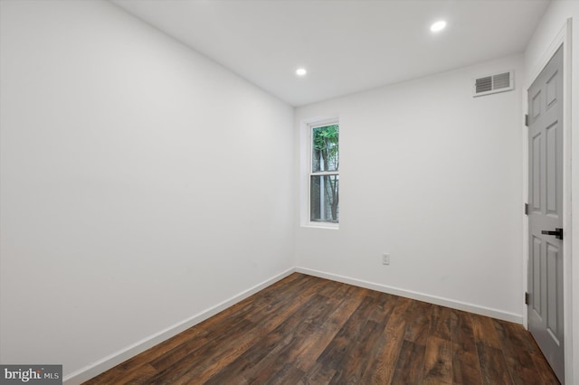 1408 N Redfield St, Philadelphia, PA 19151 - unfurnished bedroom with dark wood-style flooring and recessed lighting