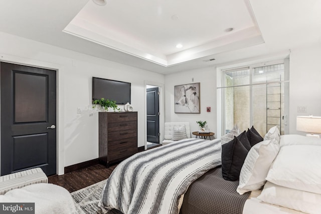 1518 Frankford Ave Unit 1, Philadelphia, PA 19125 - bedroom featuring a tray ceiling and dark wood finished floors