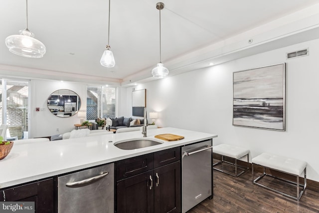 1518 Frankford Ave Unit 1, Philadelphia, PA 19125 - kitchen with stainless steel dishwasher, open floor plan, light countertops, and dark wood finished floors