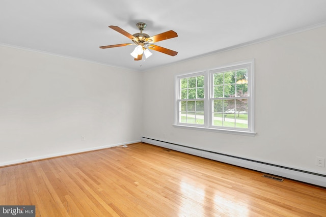 10833 Hunting Ln, Columbia, MD 21044 - spare room with baseboard heating, crown molding, wood finished floors, and ceiling fan