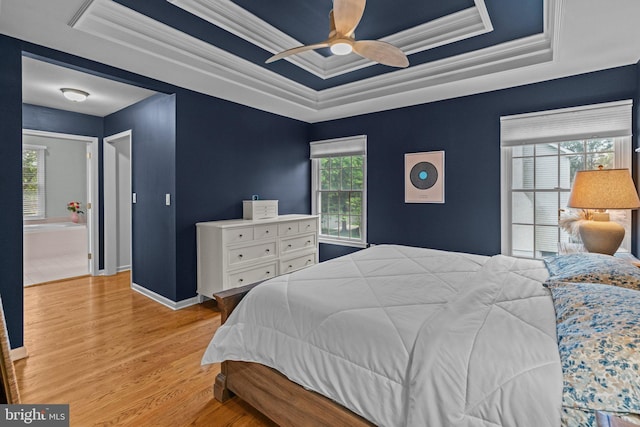 14 Leapson Ln, Doylestown, PA 18901 - bedroom featuring a raised ceiling, wood finished floors, ornamental molding, and a ceiling fan