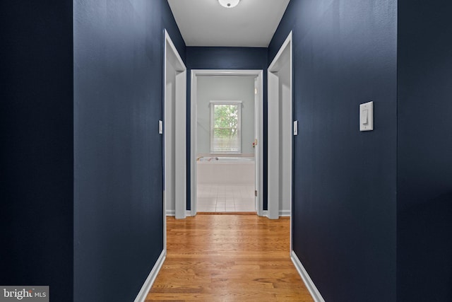 14 Leapson Ln, Doylestown, PA 18901 - hallway featuring light wood-style floors and baseboards