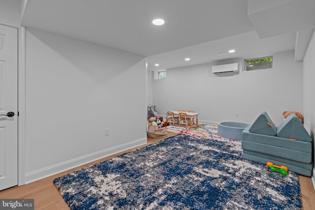 14 Leapson Ln, Doylestown, PA 18901 - game room with a wall unit AC, wood finished floors, and recessed lighting