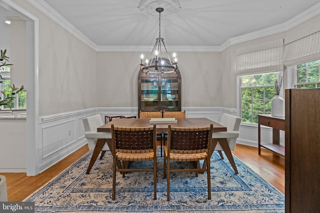 14 Leapson Ln, Doylestown, PA 18901 - dining space featuring a chandelier, wood finished floors, ornamental molding, and wainscoting