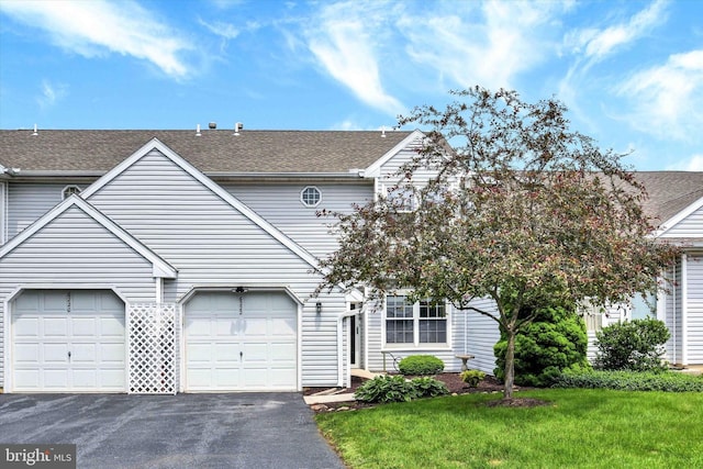 6222 Spring Knoll Dr, Harrisburg, PA 17111 - townhome / multi-family property featuring driveway, a front yard, and roof with shingles