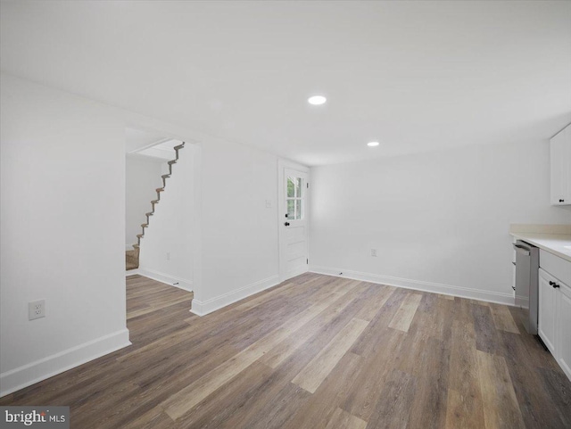 667 Thompson Rd, Needmore, PA 17238 - unfurnished living room with wood finished floors, stairs, and recessed lighting