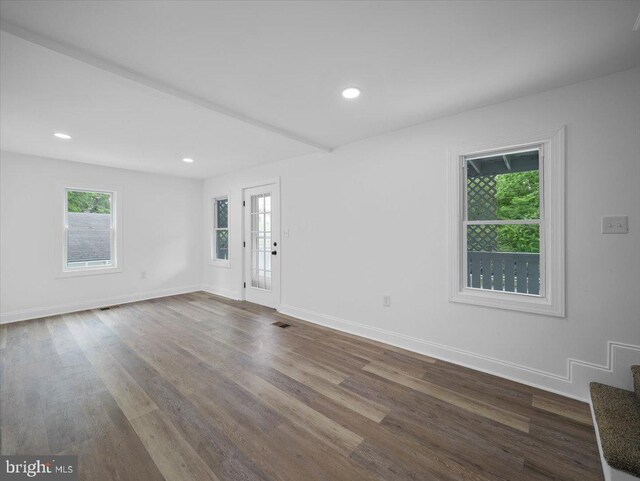667 Thompson Rd, Needmore, PA 17238 - unfurnished living room featuring dark wood-style floors, recessed lighting, and stairs
