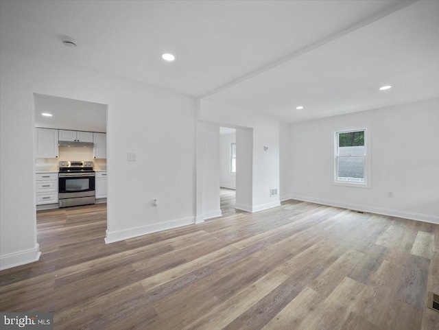 667 Thompson Rd, Needmore, PA 17238 - unfurnished living room featuring light wood-type flooring and recessed lighting