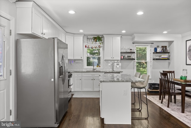 100 Carolina Ave, Cherry Hill, NJ 08003 - kitchen featuring appliances with stainless steel finishes, crown molding, open shelves, a center island, and white cabinets