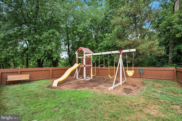 400 Glendale Rd Unit E 13, Havertown, PA 19083 - view of playground with a fenced backyard and view of wooded area