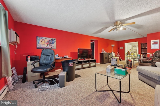 400 Glendale Rd Unit E 13, Havertown, PA 19083 - carpeted living room with ceiling fan, a desk, a baseboard radiator, and a textured ceiling