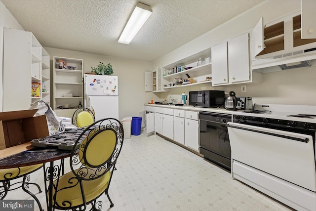 400 Glendale Rd Unit E 13, Havertown, PA 19083 - kitchen featuring open shelves, black appliances, a textured ceiling, white cabinetry, and under cabinet range hood