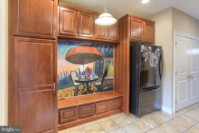 162 High Pointe Dr, Hummelstown, PA 17036 - kitchen featuring freestanding refrigerator, light tile patterned floors, brown cabinets, hanging light fixtures, and recessed lighting