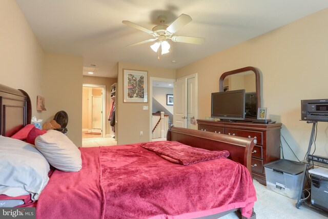 162 High Pointe Dr, Hummelstown, PA 17036 - carpeted bedroom with connected bathroom and a ceiling fan