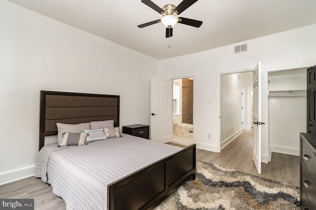 915 N Montford Ave, Baltimore, MD 21205 - bedroom featuring wood finished floors, ceiling fan, and connected bathroom