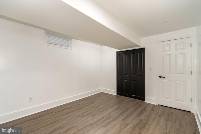 915 N Montford Ave, Baltimore, MD 21205 - unfurnished bedroom with wood finished floors and baseboards
