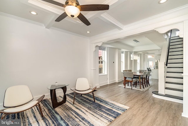 915 N Montford Ave, Baltimore, MD 21205 - living area featuring ornamental molding, stairs, wood finished floors, coffered ceiling, and beamed ceiling