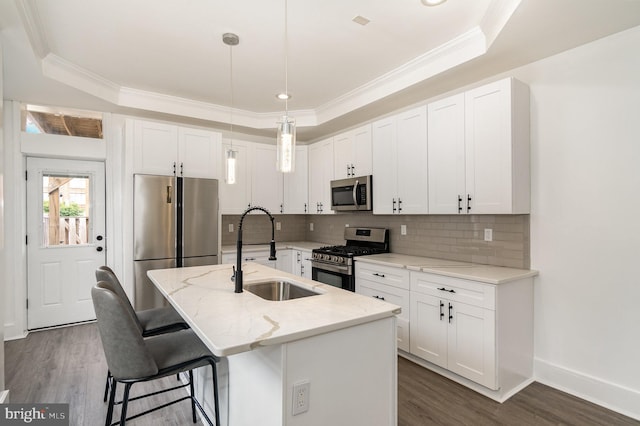 915 N Montford Ave, Baltimore, MD 21205 - kitchen with stainless steel appliances, crown molding, white cabinetry, tasteful backsplash, and dark wood-style floors