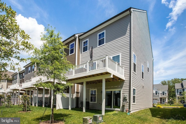 18351 Moss Garden Rd, Dumfries, VA 22026 - rear view of house featuring a lawn and a deck