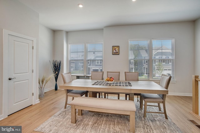 18351 Moss Garden Rd, Dumfries, VA 22026 - dining space featuring light wood finished floors, healthy amount of natural light, and recessed lighting