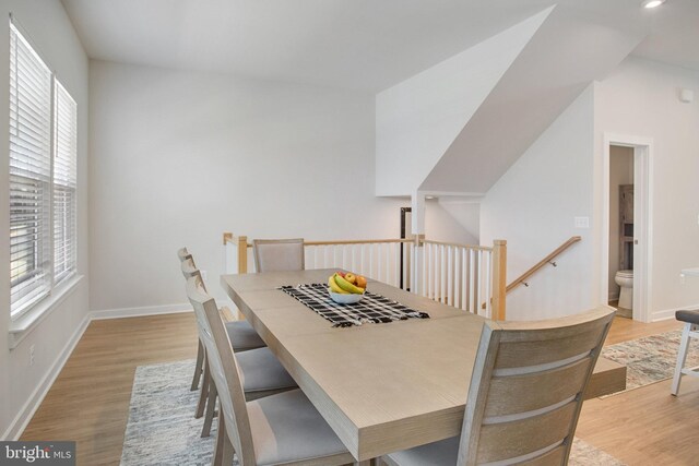 18351 Moss Garden Rd, Dumfries, VA 22026 - dining space with light wood finished floors and recessed lighting