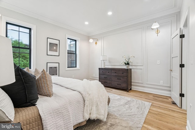 1310 E Passyunk Ave, Philadelphia, PA 19147 - bedroom featuring light wood-type flooring, crown molding, and recessed lighting