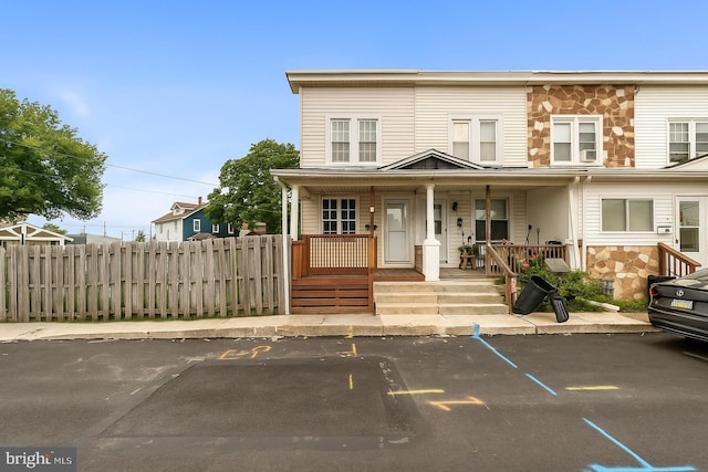 16 Richardson Ave, Linwood, PA 19061 - townhome / multi-family property with stone siding and a porch