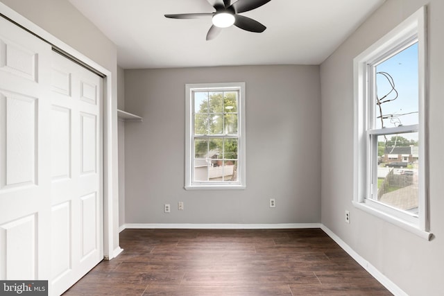 16 Richardson Ave, Linwood, PA 19061 - unfurnished bedroom with dark wood-style flooring, a closet, and a ceiling fan