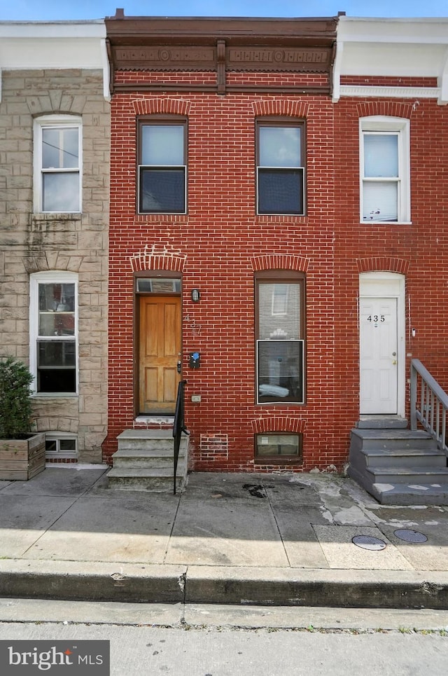 437 Pitman Pl, Baltimore, MD 21202 - multi unit property with entry steps, brick siding, and stone siding