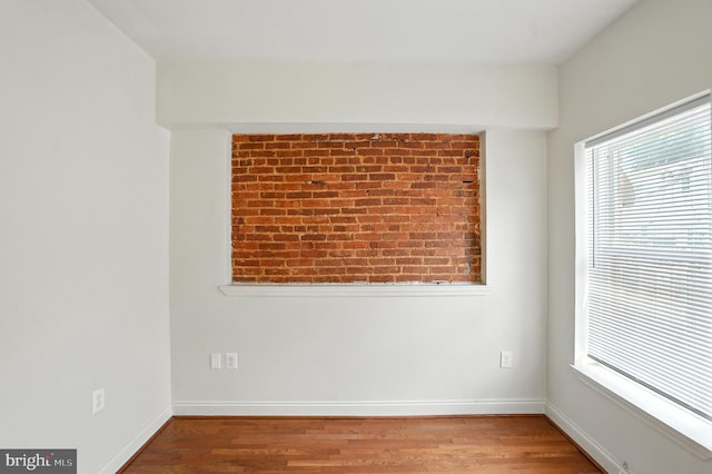 437 Pitman Pl, Baltimore, MD 21202 - unfurnished room featuring wood finished floors and baseboards