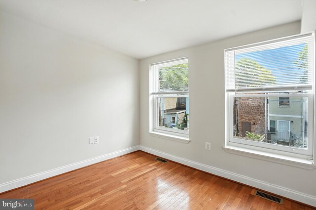 437 Pitman Pl, Baltimore, MD 21202 - empty room with baseboards and light wood-style flooring