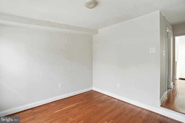 437 Pitman Pl, Baltimore, MD 21202 - empty room with baseboards and wood-type flooring