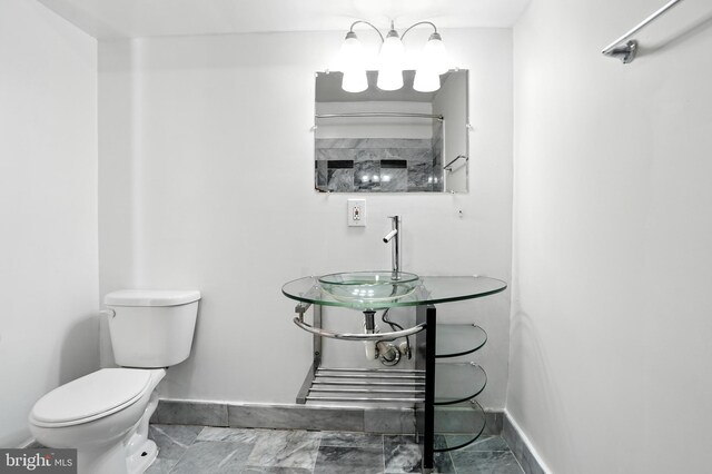 437 Pitman Pl, Baltimore, MD 21202 - bathroom with toilet and a sink