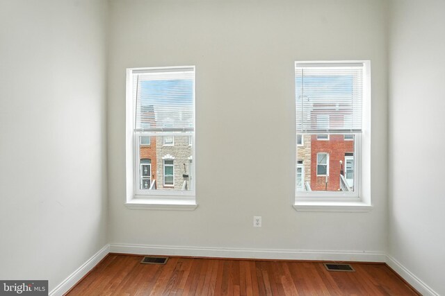 437 Pitman Pl, Baltimore, MD 21202 - spare room with wood finished floors and plenty of natural light