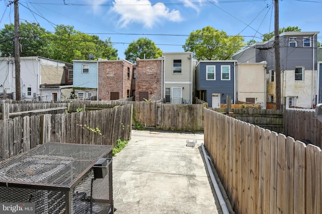 437 Pitman Pl, Baltimore, MD 21202 - fenced backyard featuring a patio