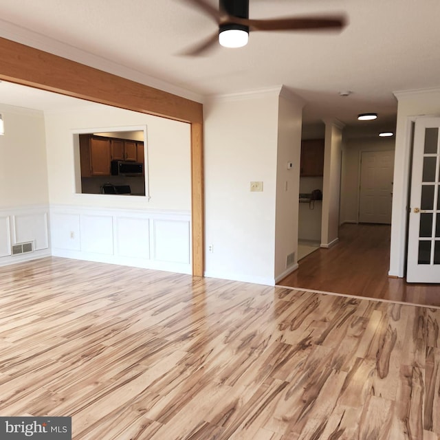 184 Steven Ln, Wilmington, DE 19808 - unfurnished living room featuring wood finished floors, ceiling fan, and ornamental molding