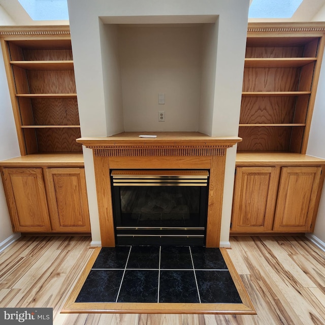 184 Steven Ln, Wilmington, DE 19808 - detailed view of a fireplace with flush hearth and wood finished floors